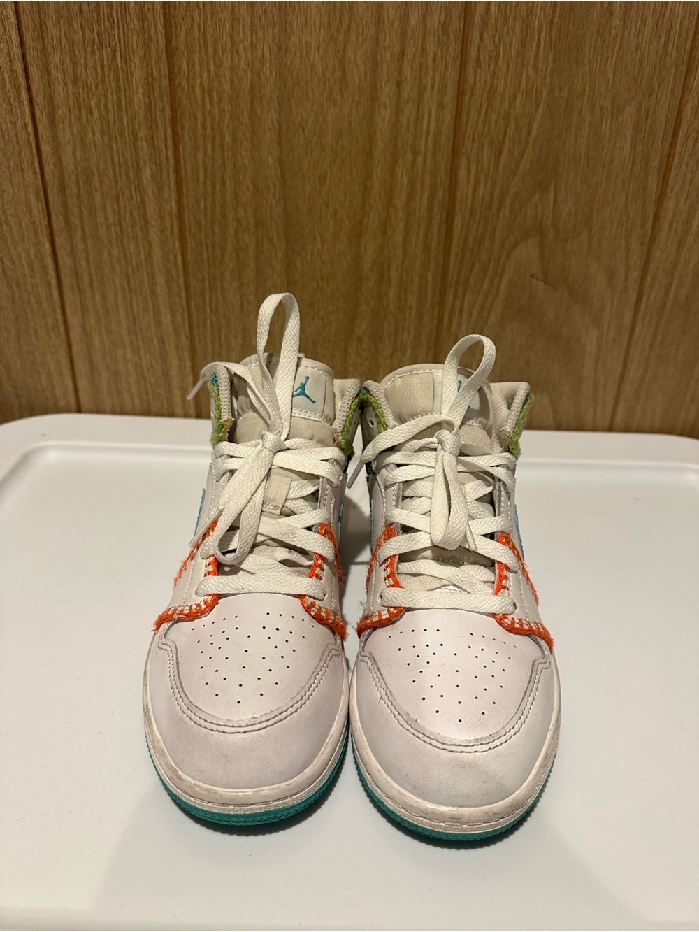 Jordan Kids White High-Top Sneakers with Teal & Orange Accents